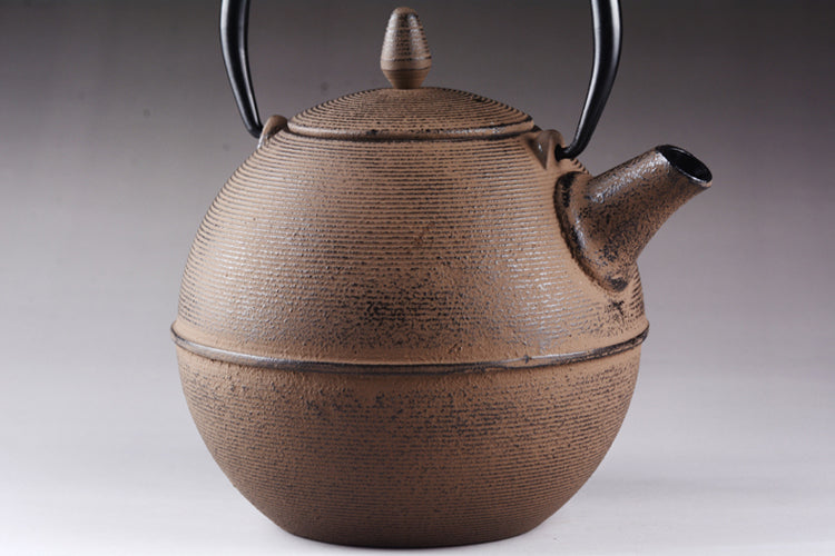 Handmade pill-shaped cast iron pot
