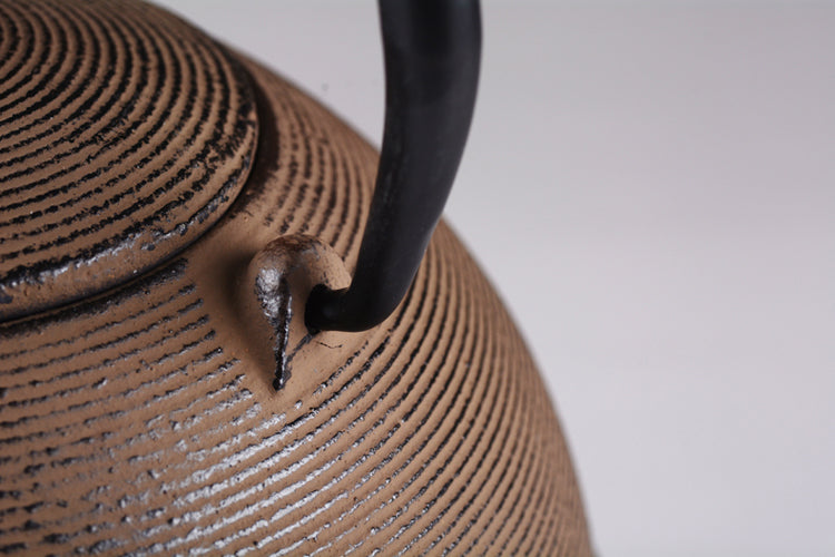 Handmade pill-shaped cast iron pot