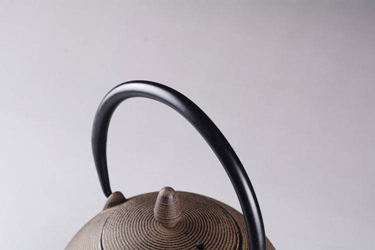 Handmade pill-shaped cast iron pot