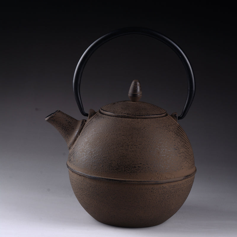 Handmade pill-shaped cast iron pot